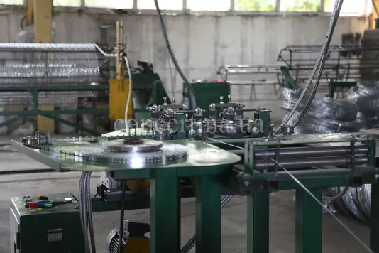 Вальцювання армованої колючої стрічки Концертина